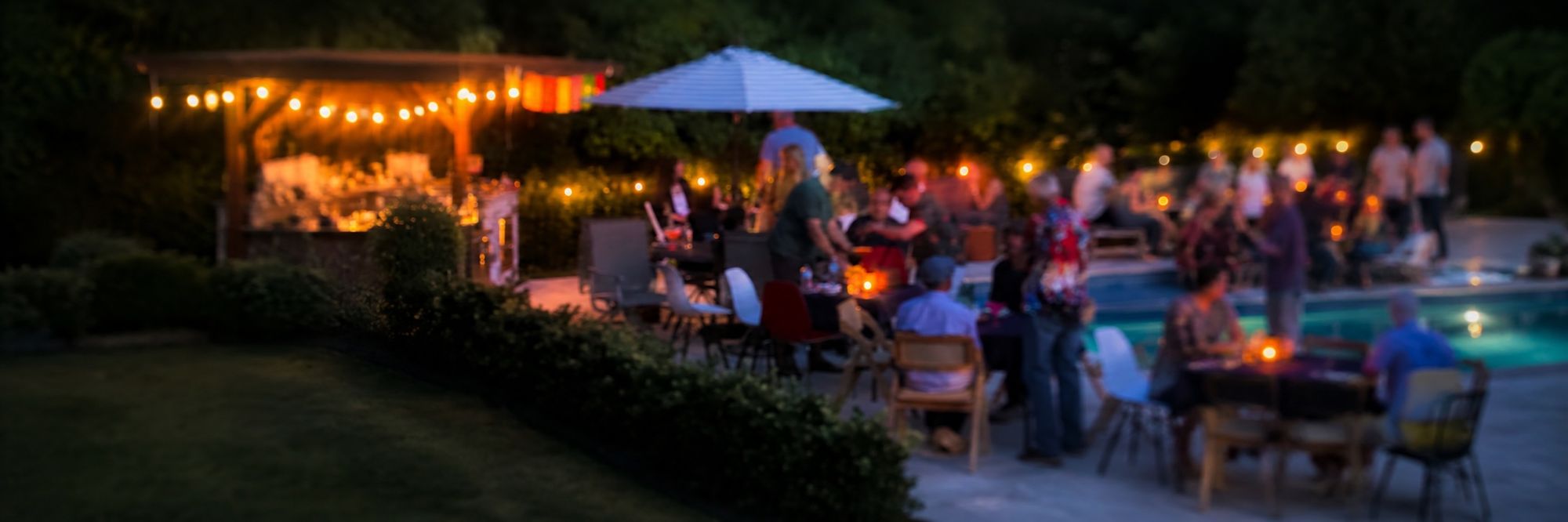 A warmly lit worship dinner gathering in progress